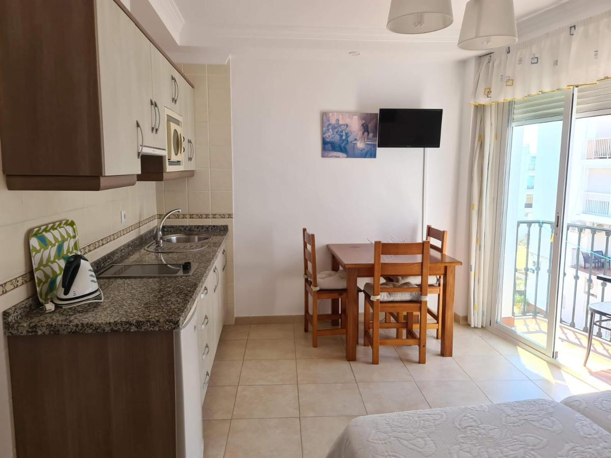 Apartamentos El Barrio Nerja Bagian luar foto